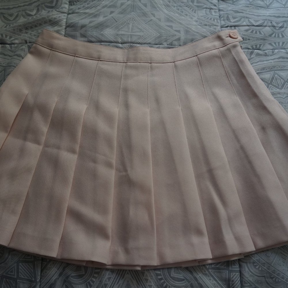 Baby pink pleated tennis mini skirt
